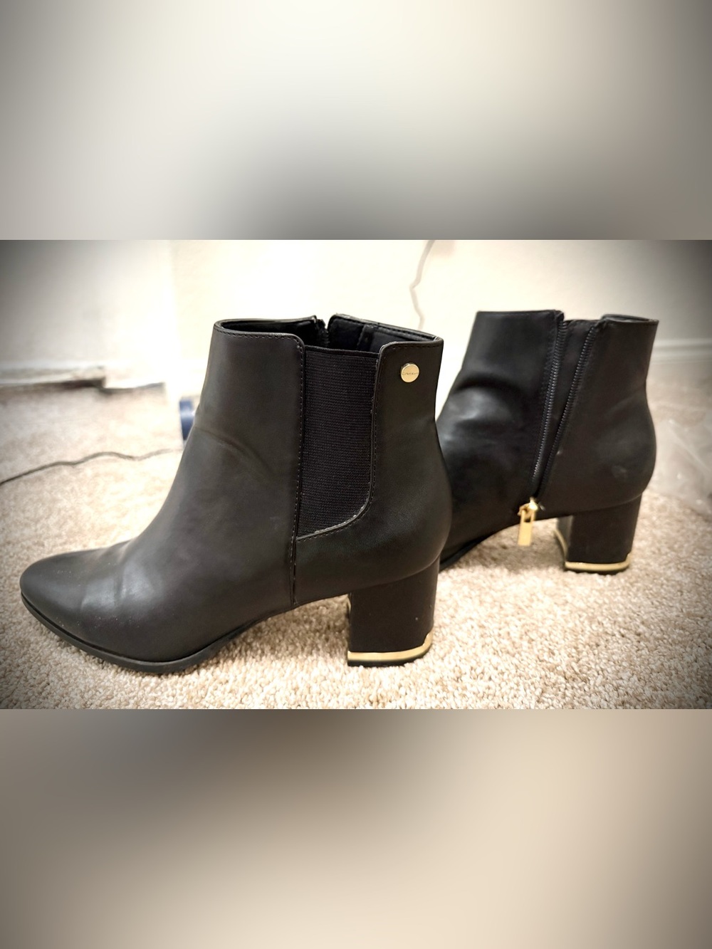Calvin Klein Black Ankle Booties with Gold Trim